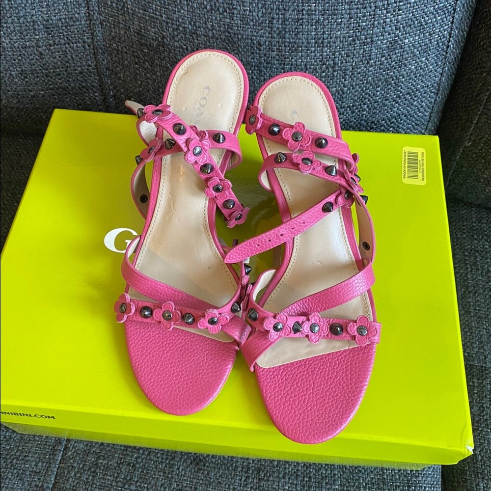 Coach wedge heels in pink.
